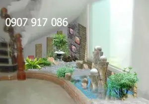 Hòn non bộ dưới chân cầu thang Biểu tượng phong thủy tinh tế và nghệ thuật trang trí không gian sống